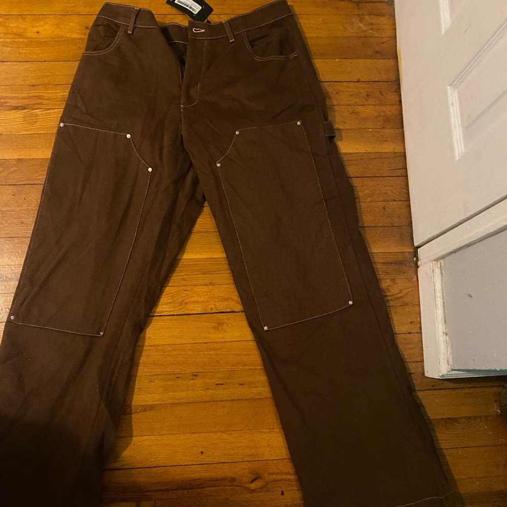 Vintage brown carpenter pants with pink stitching